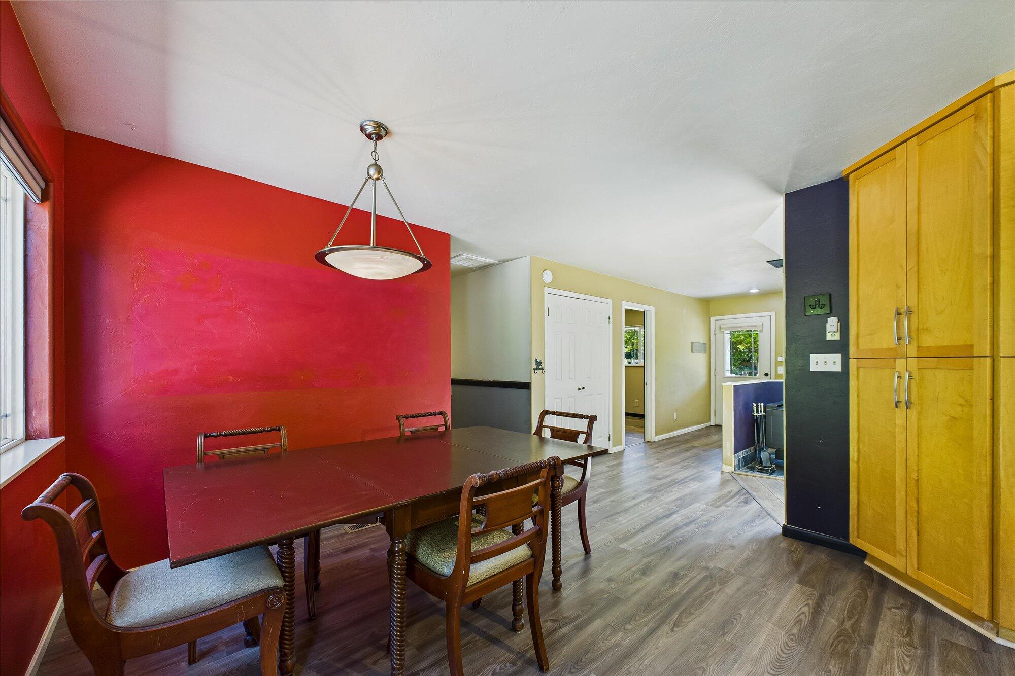 1945 Grange Road McKinleyville, CA 95519 - Photo 19 of 62 a view of a dining room with furniture and wooden floor