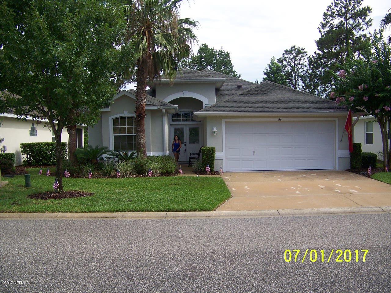 146 Raintree Circle Palm Coast, FL 32164 - Photo 1 of 18 Front