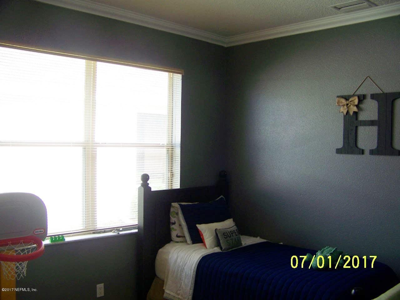 146 Raintree Circle Palm Coast, FL 32164 - Photo 12 of 18 Bedroom 3
