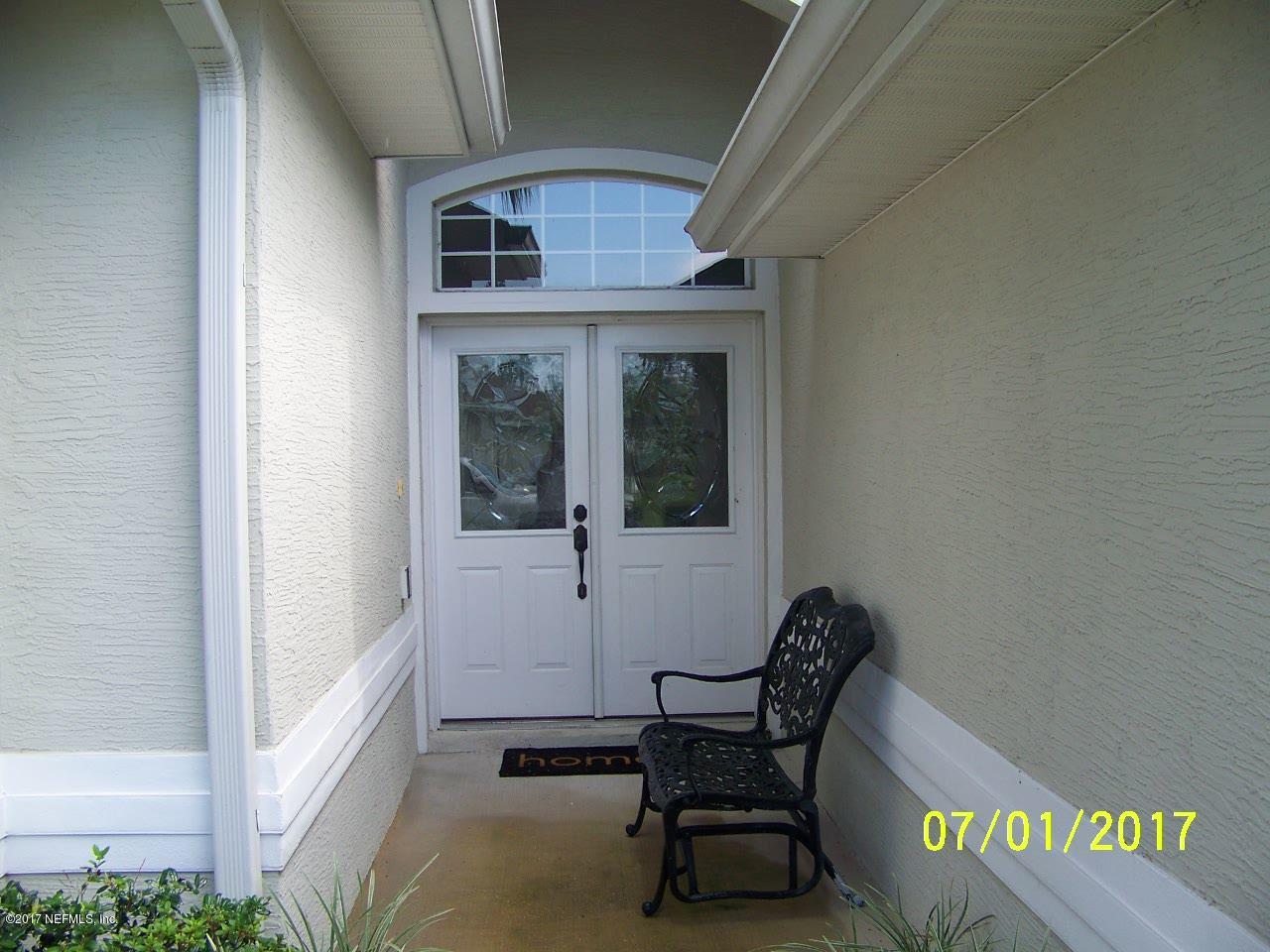 146 Raintree Circle Palm Coast, FL 32164 - Photo 16 of 18 Entrance