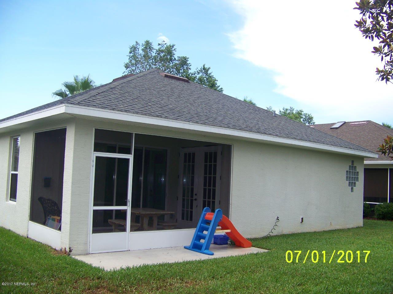 146 Raintree Circle Palm Coast, FL 32164 - Photo 17 of 18 Rear view