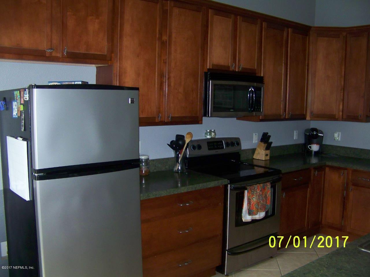 146 Raintree Circle Palm Coast, FL 32164 - Photo 4 of 18 Kitchen