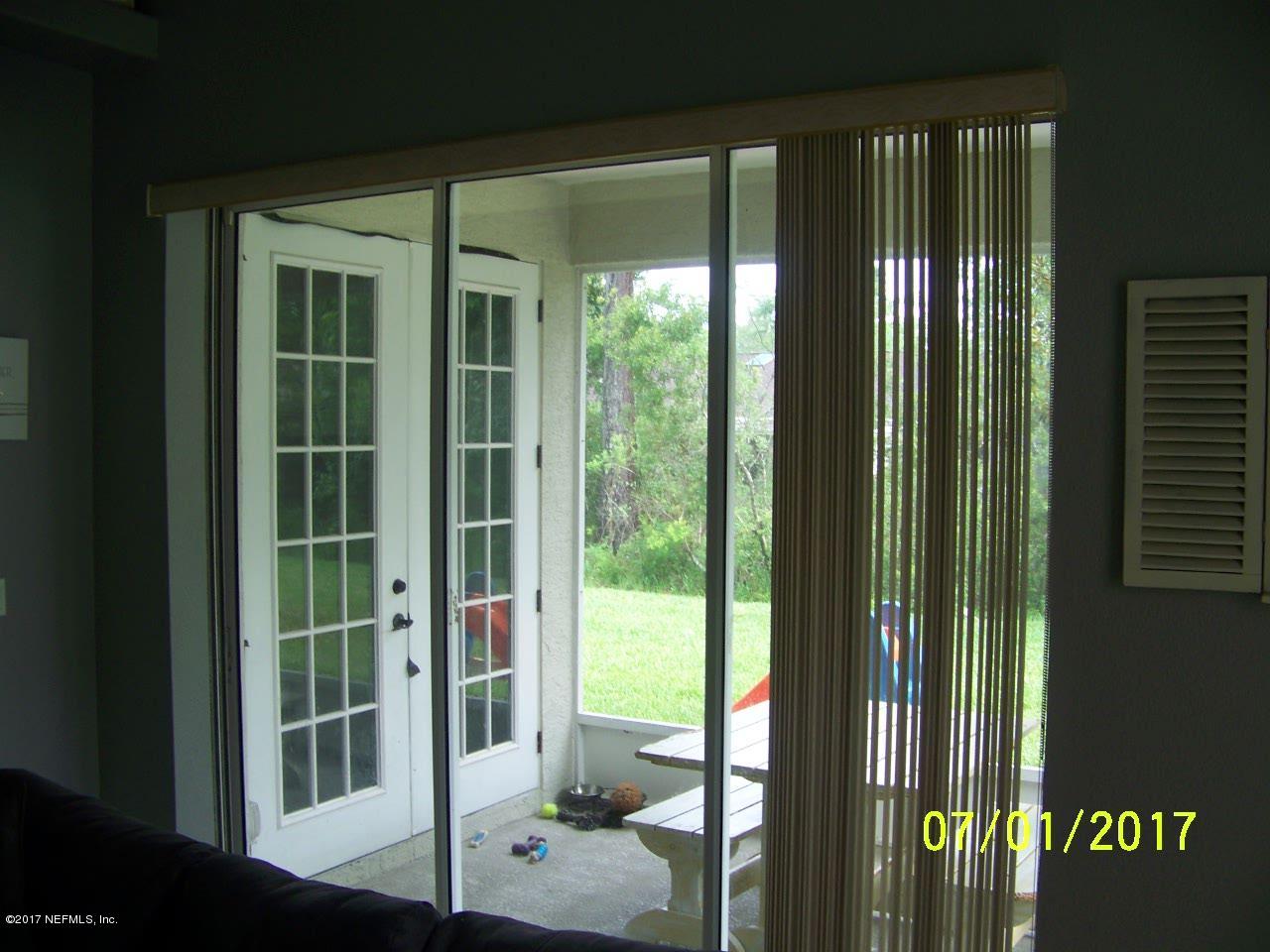 146 Raintree Circle Palm Coast, FL 32164 - Photo 6 of 18 Panoramic patio sliding doors