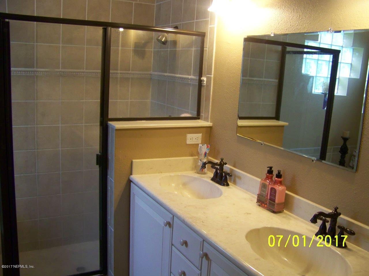 146 Raintree Circle Palm Coast, FL 32164 - Photo 9 of 18 Master bath walk in shower