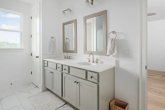 a bathroom with a sink and toilet