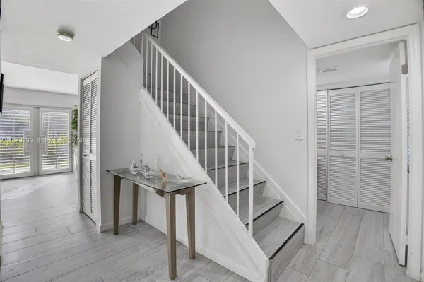 a view of a bathroom from the hallway
