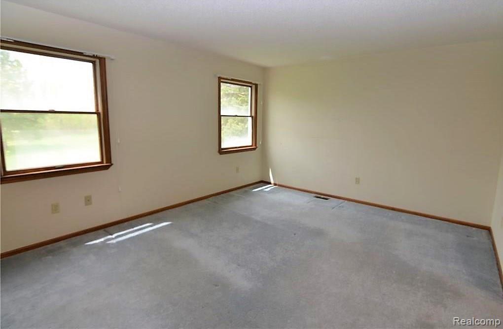 11365 Linden Road Linden, MI 48451 - Photo 17 of 22 CARPET BEING PROFESSIONALLY CLEANED TODAY