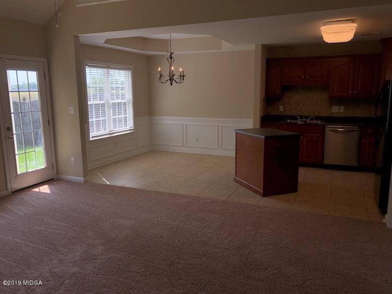 443 Bob White Road Macon, GA 31216 - Photo 3 of 7 a living room with furniture and a window
