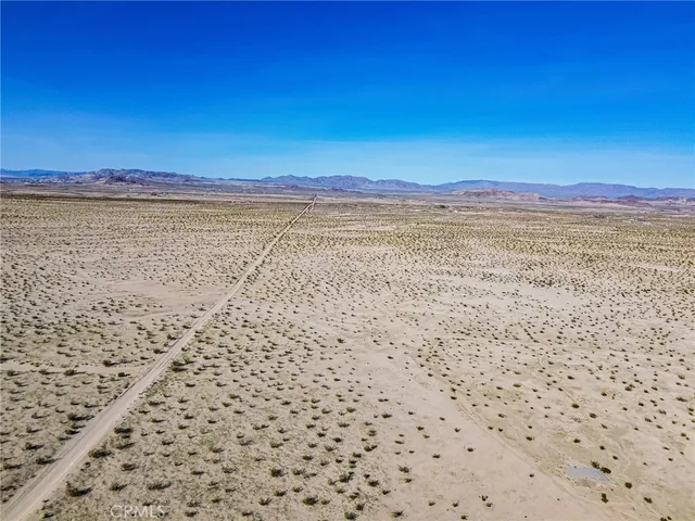 a view of beach and an ocean