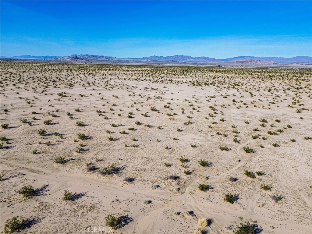 76100 2 Mile Road Twentynine Palms, CA 92277 - Photo 33 of 37 a view of a large mountain with a garden