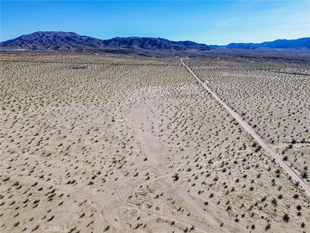 76100 2 Mile Road Twentynine Palms, CA 92277 - Photo 4 of 37 a view of a pathway with a yard