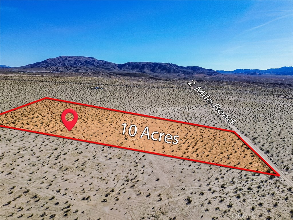 76100 2 Mile Road Twentynine Palms, CA 92277 - Photo 6 of 37 a view of a street with a building in the background