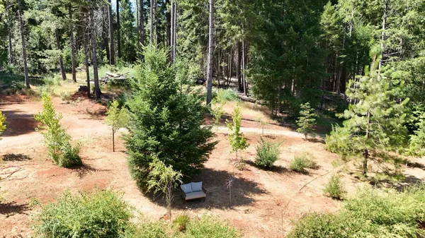 a backyard of a house with a yard