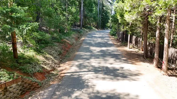 a picture of a bathroom with a sink and a mirror