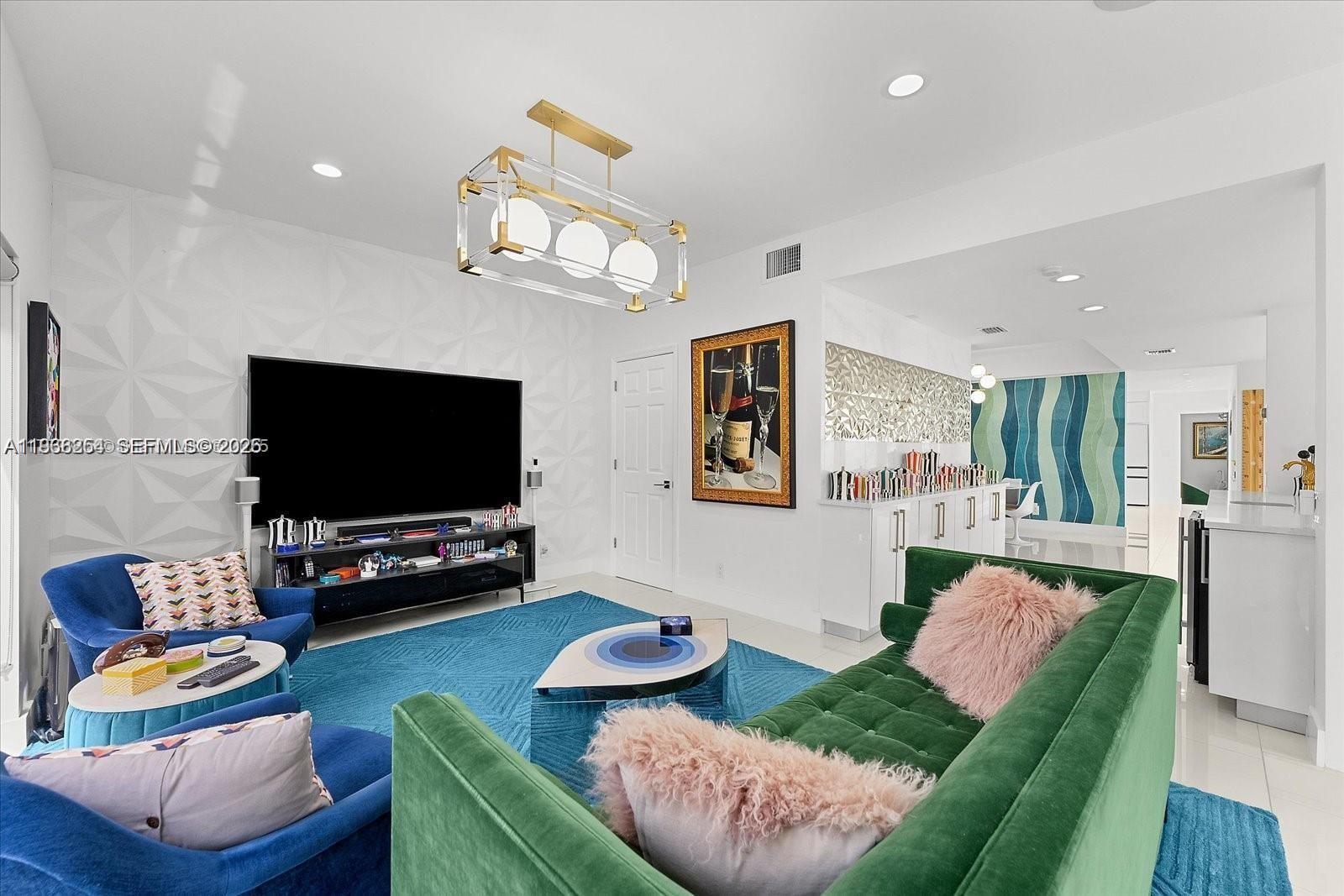 22818 El Dorado Drive Boca Raton, FL 33433 - Photo 14 of 37 a living room with furniture and a flat screen tv