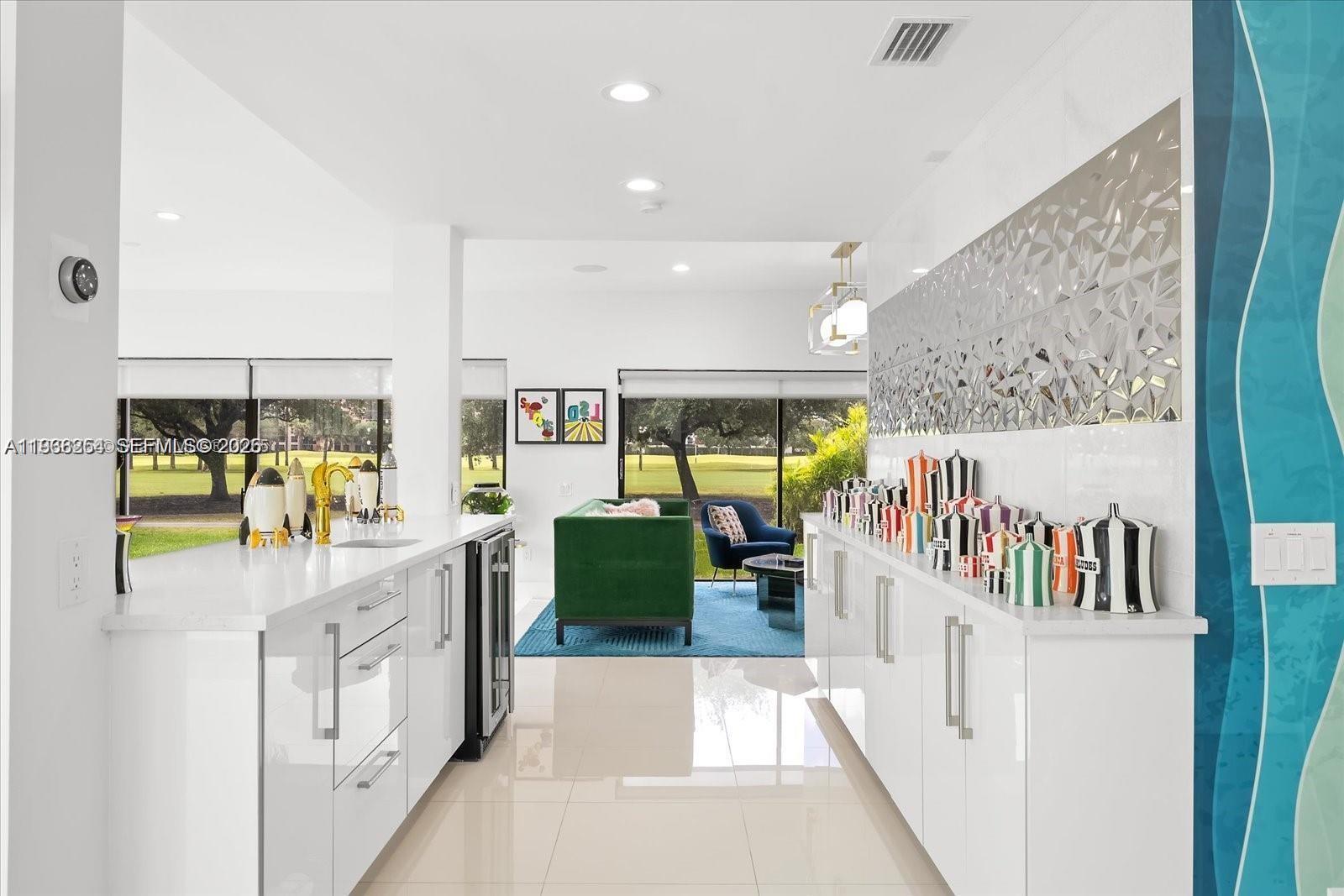 22818 El Dorado Drive Boca Raton, FL 33433 - Photo 21 of 37 a kitchen with stainless steel appliances lots of counter top space