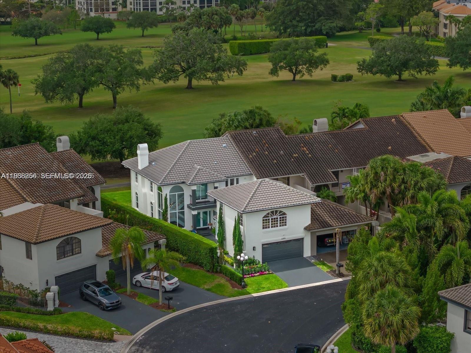 22818 El Dorado Drive Boca Raton, FL 33433 - Photo 6 of 37 an aerial view of a house with big yard