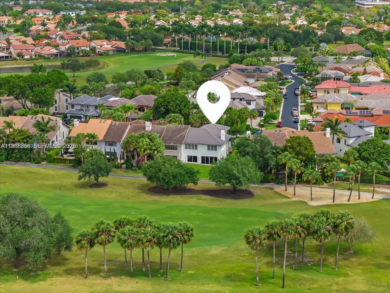 22818 El Dorado Drive Boca Raton, FL 33433 - Photo 7 of 37 a view of a house with a big yard