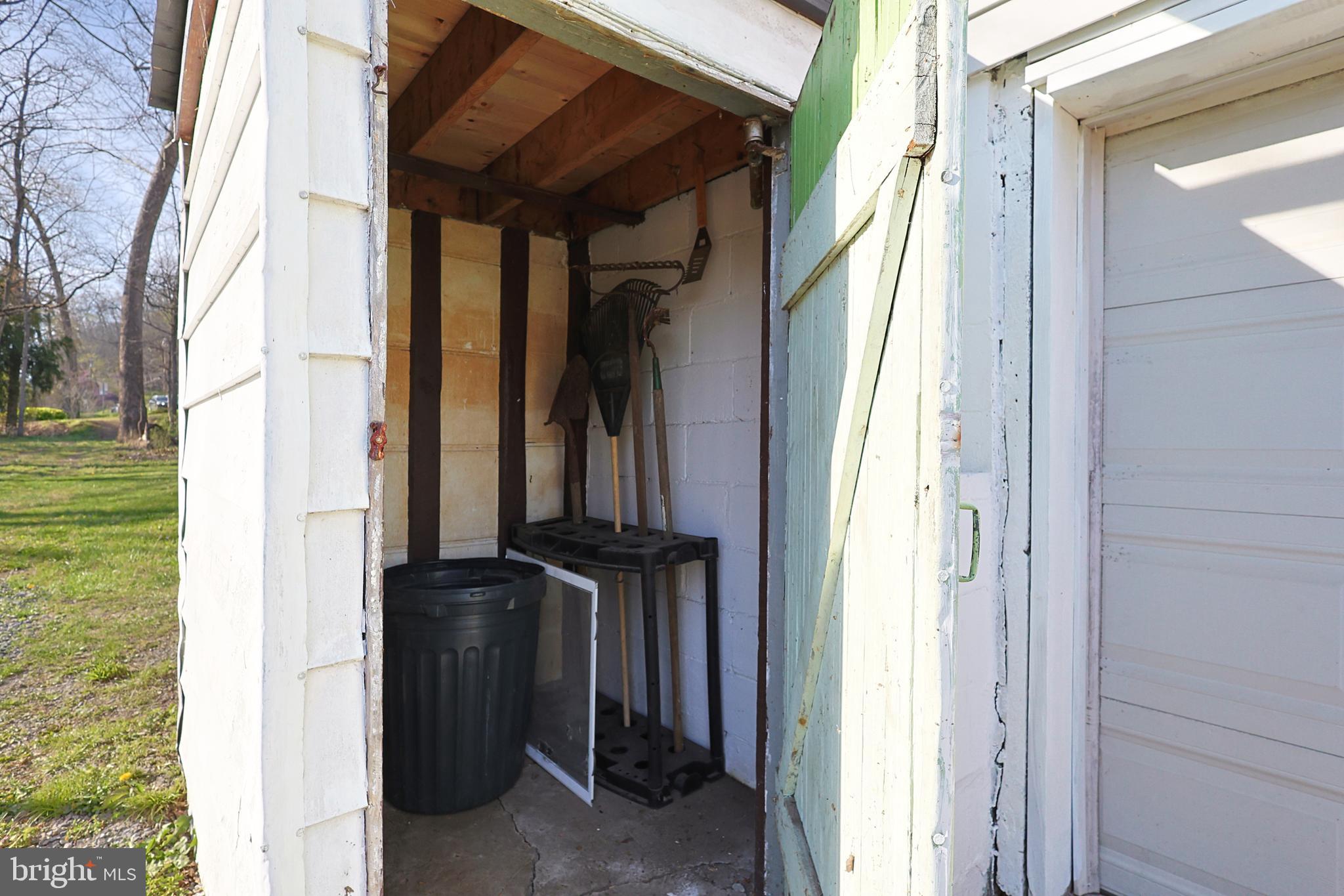 179 Rocket Center Road Keyser, WV 26726 - Photo 30 of 36 Storage under exterior back stairs