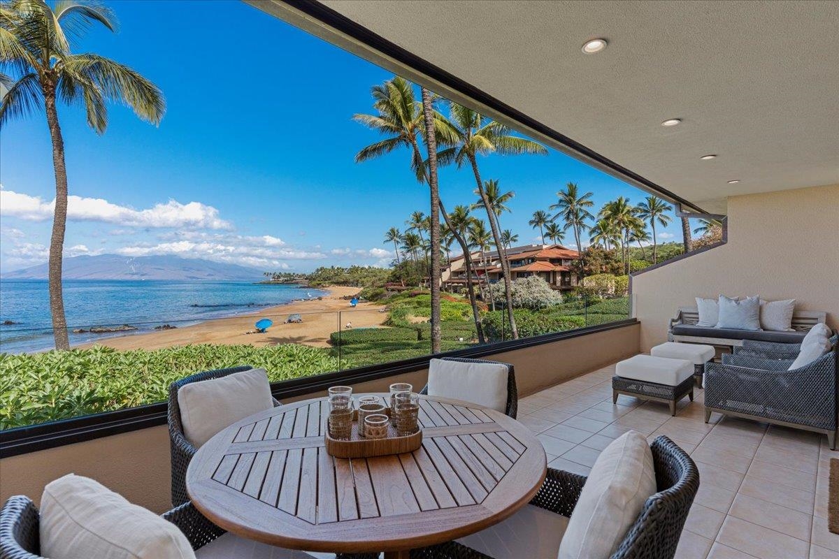 4850 Makena Alanui Road, Unit E205 Kihei, HI 96753 - Photo 3 of 45 a outdoor living space with furniture