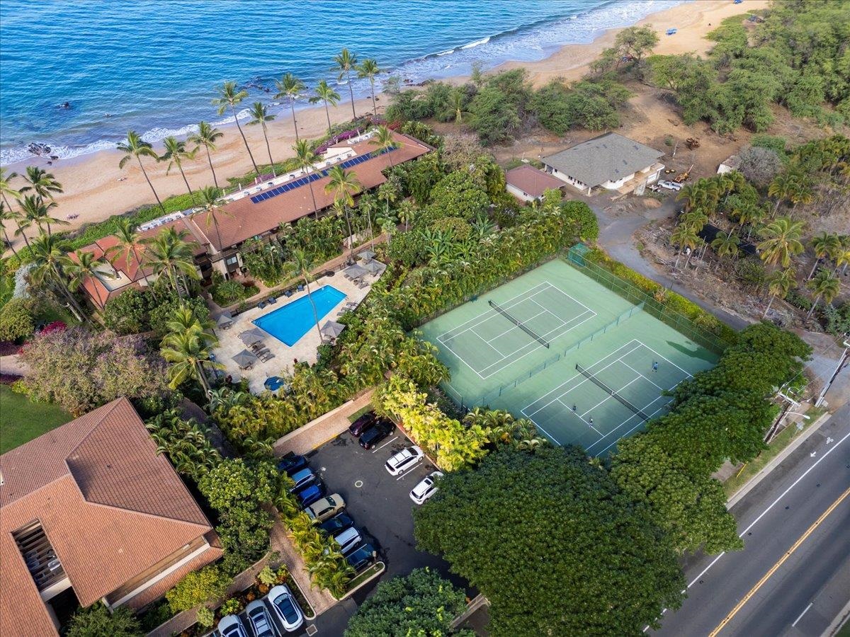 4850 Makena Alanui Road, Unit E205 Kihei, HI 96753 - Photo 36 of 45 an aerial view of a house a yard and outdoor seating
