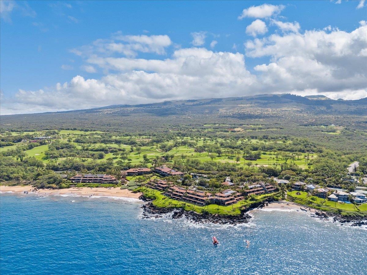 4850 Makena Alanui Road, Unit E205 Kihei, HI 96753 - Photo 39 of 45 a view of a swimming pool with an outdoor space