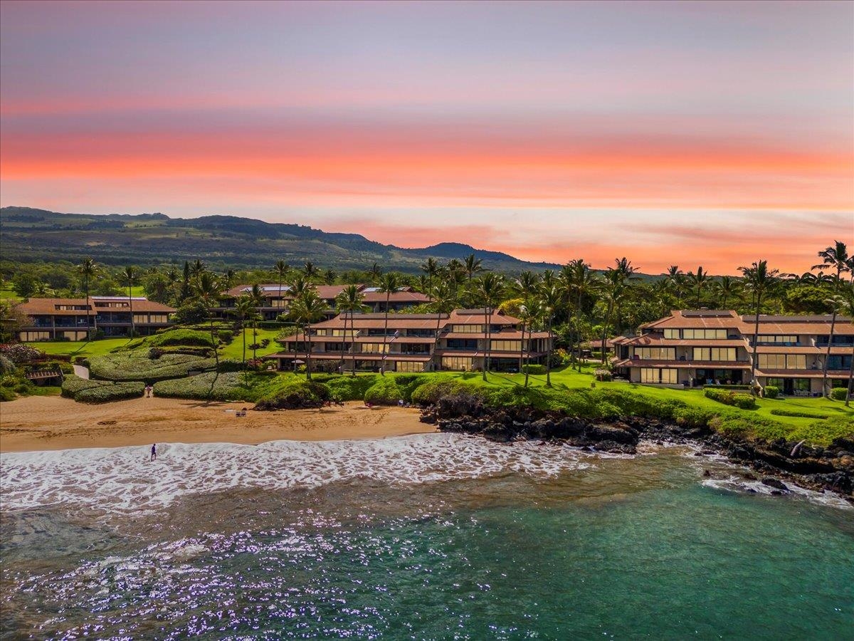 4850 Makena Alanui Road, Unit E205 Kihei, HI 96753 - Photo 6 of 45 a view of a town with mountains and mountains in the background