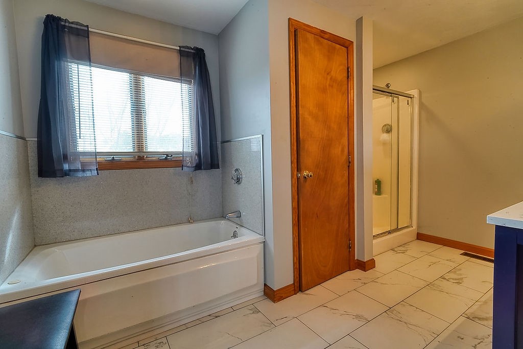 42 Kiley Way Coventry, RI 02816 - Photo 14 of 43 Master Bath with a jacuzzi tub and stand-up shower.
