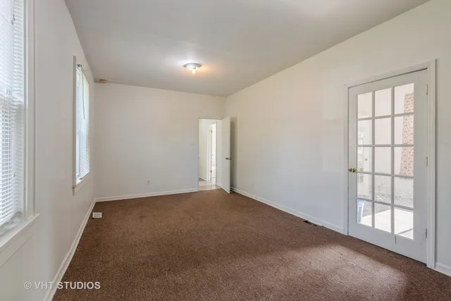 an empty room with windows