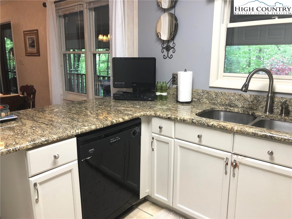 257 Cameron Terrace Boone, NC 28607 - Photo 13 of 42 a kitchen with sink and window