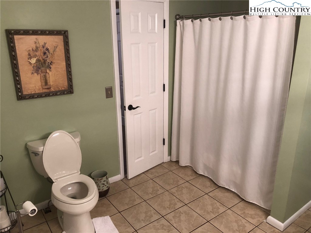 257 Cameron Terrace Boone, NC 28607 - Photo 17 of 42 a bathroom with a toilet and a sink