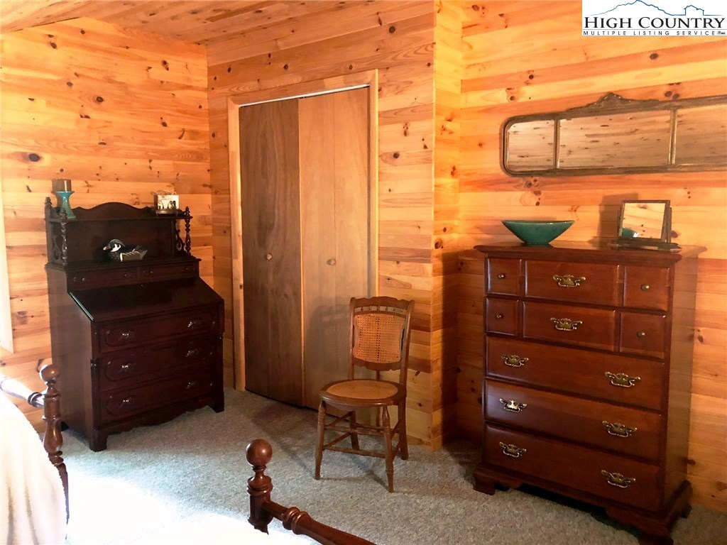 257 Cameron Terrace Boone, NC 28607 - Photo 29 of 42 a room with a dresser and a mirror