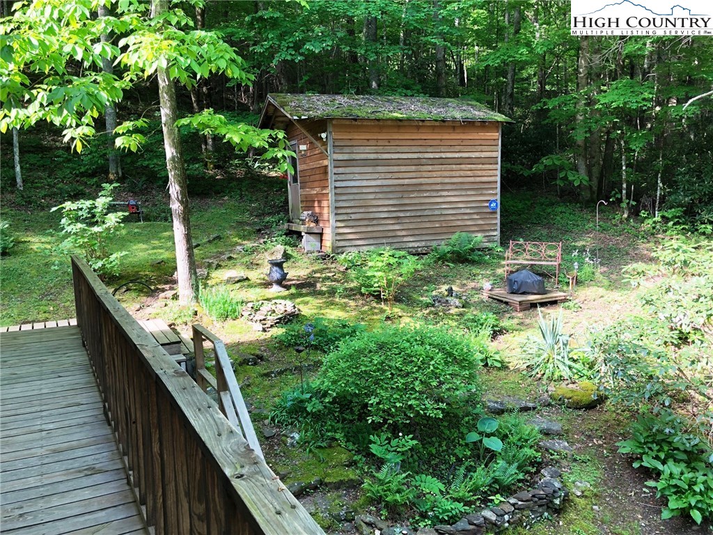 257 Cameron Terrace Boone, NC 28607 - Photo 38 of 42 a backyard of a house with lots of green space