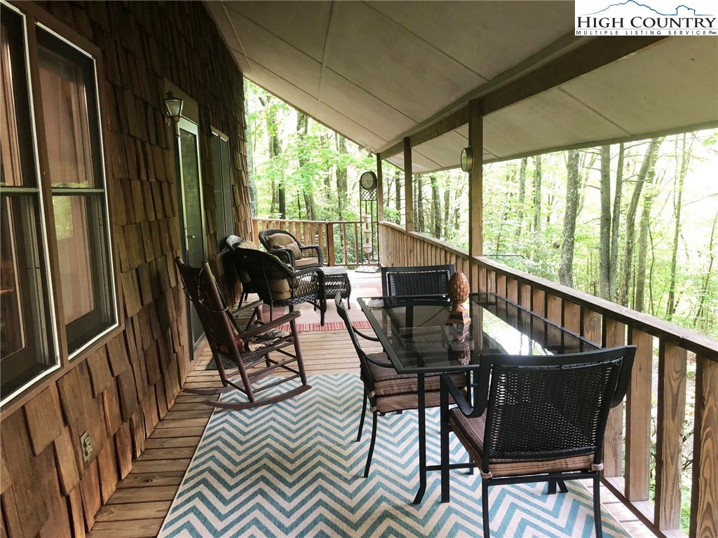 257 Cameron Terrace Boone, NC 28607 - Photo 4 of 42 a view of a dining room with furniture window and outside view