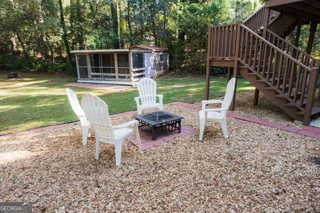a view of outdoor space with wooden floor and window