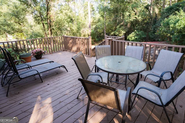 a view of house with outdoor space and garden