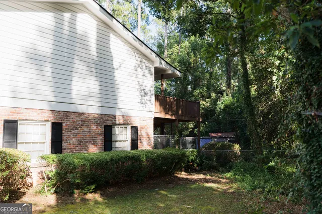 a view of front door with wooden floor