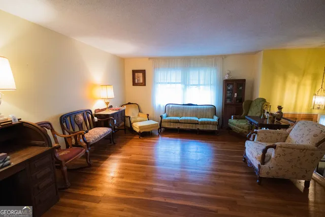 a bathroom with a sink vanity and mirror