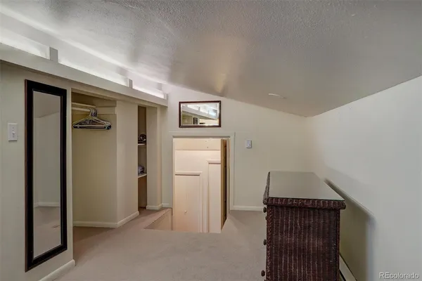 wooden floor in a hall with an entryway
