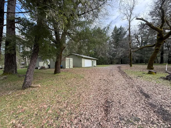a house with trees in front of it
