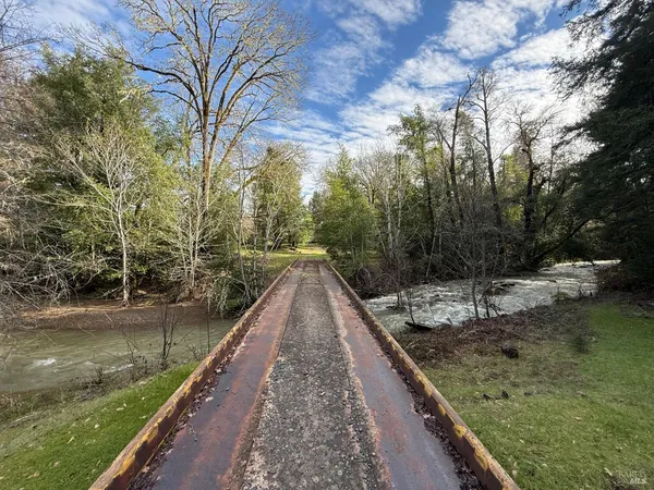 a view of swimming pool with a yard