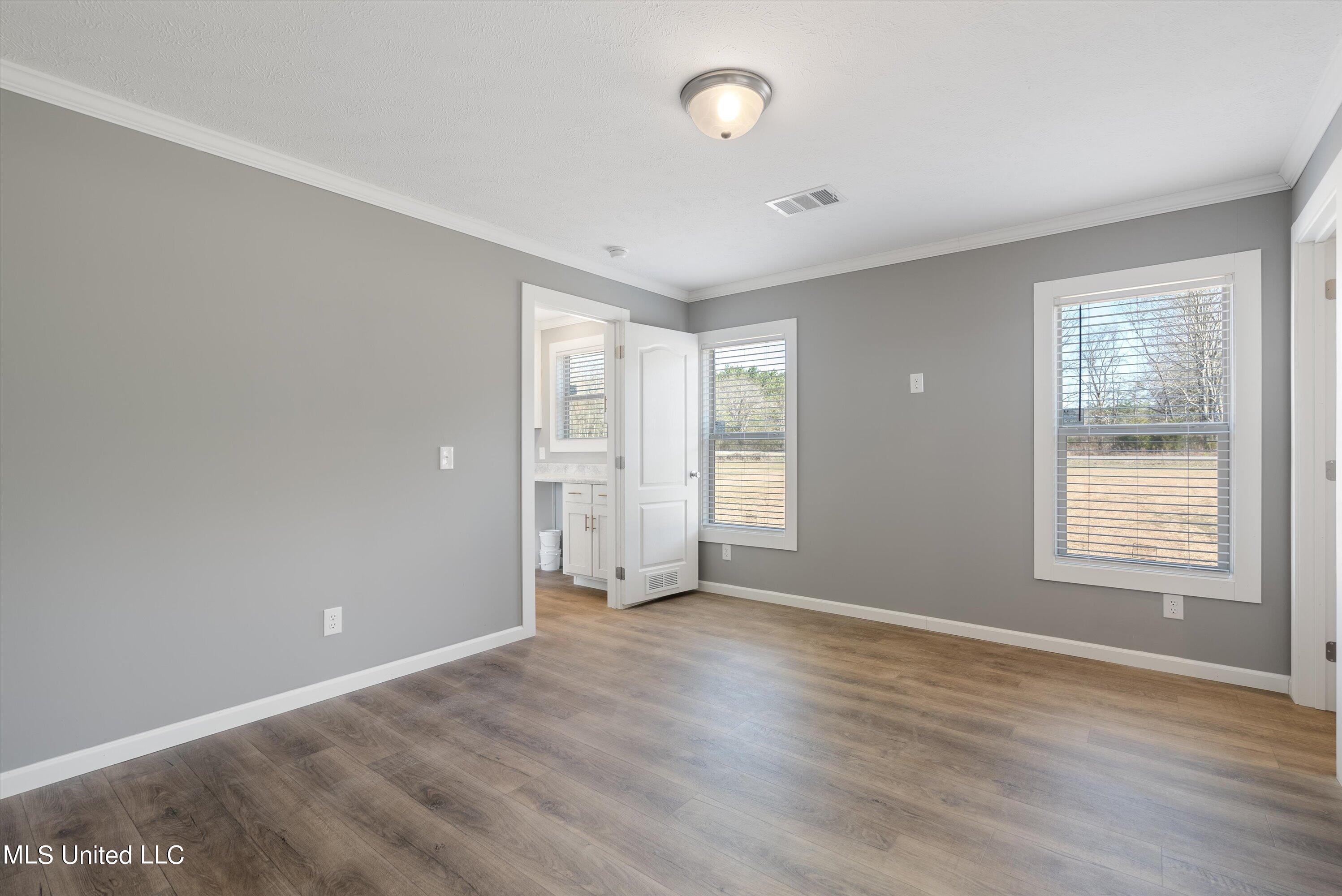 256 McCauley Road Holly Springs, MS 38635 - Photo 16 of 36 16-Primary Bedroom
