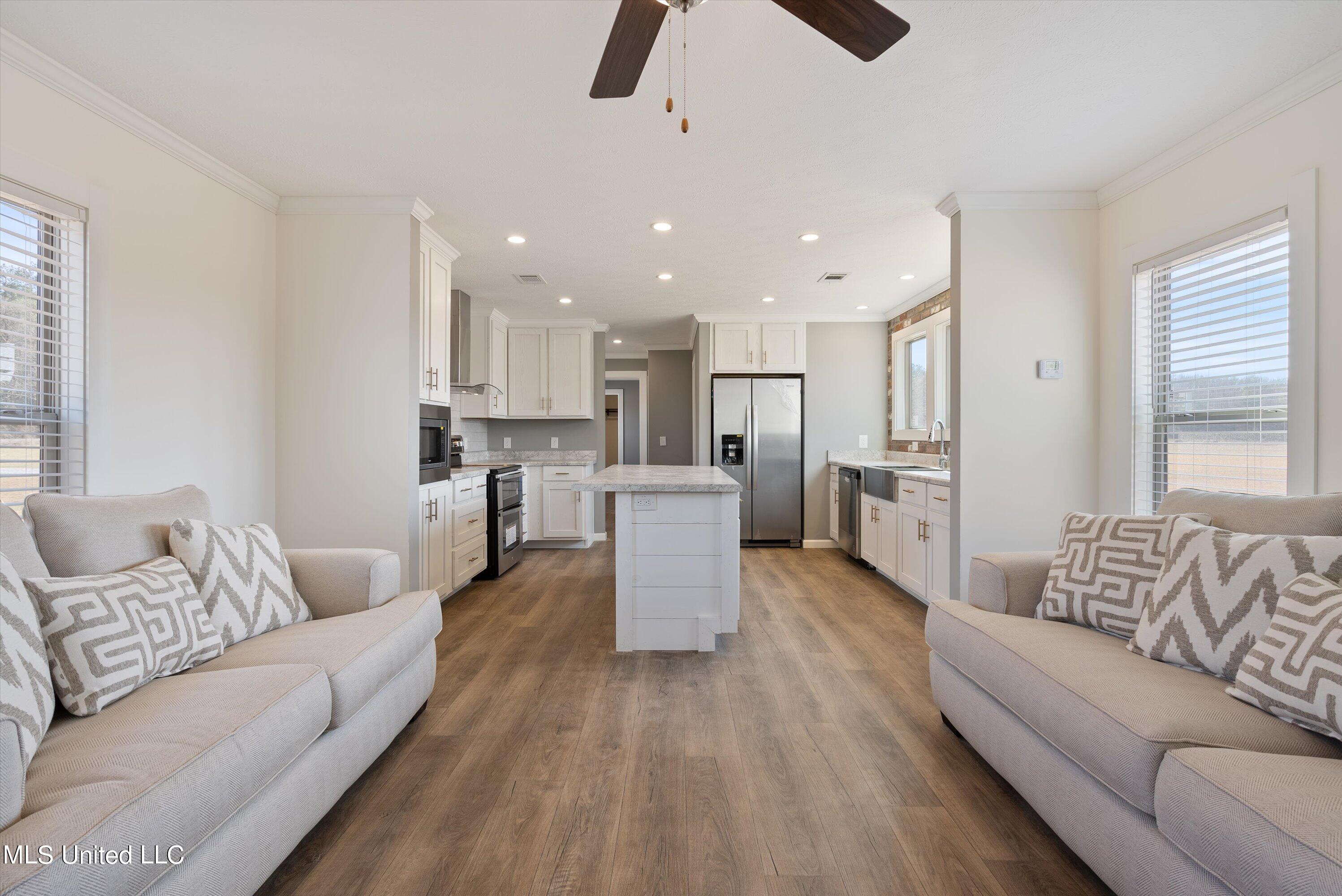 256 McCauley Road Holly Springs, MS 38635 - Photo 6 of 36 06-Great Room to Kitchen