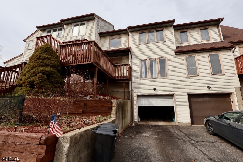4 Sickle Street Dover, NJ 07801 - Photo 1 of 45 a front view of a house with a balcony