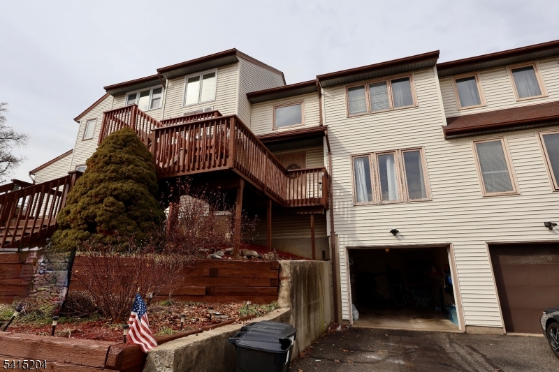 4 Sickle Street Dover, NJ 07801 - Photo 3 of 45 a front view of a house with a yard