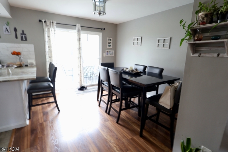 4 Sickle Street Dover, NJ 07801 - Photo 34 of 45 a view of a dining room with furniture and wooden floor