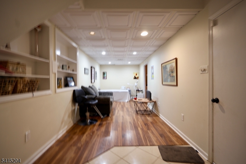 4 Sickle Street Dover, NJ 07801 - Photo 42 of 45 a living room with furniture and wooden floor