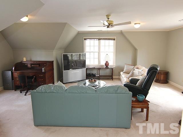 8013 Shellnut Road Raleigh, NC 27615 - Photo 15 of 25 a living room with furniture and a window