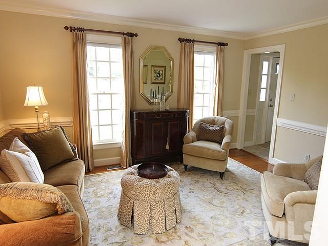 8013 Shellnut Road Raleigh, NC 27615 - Photo 5 of 25 a living room with furniture and a window
