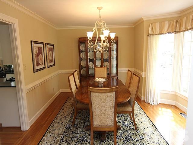 8013 Shellnut Road Raleigh, NC 27615 - Photo 6 of 25 a dining room with furniture and window